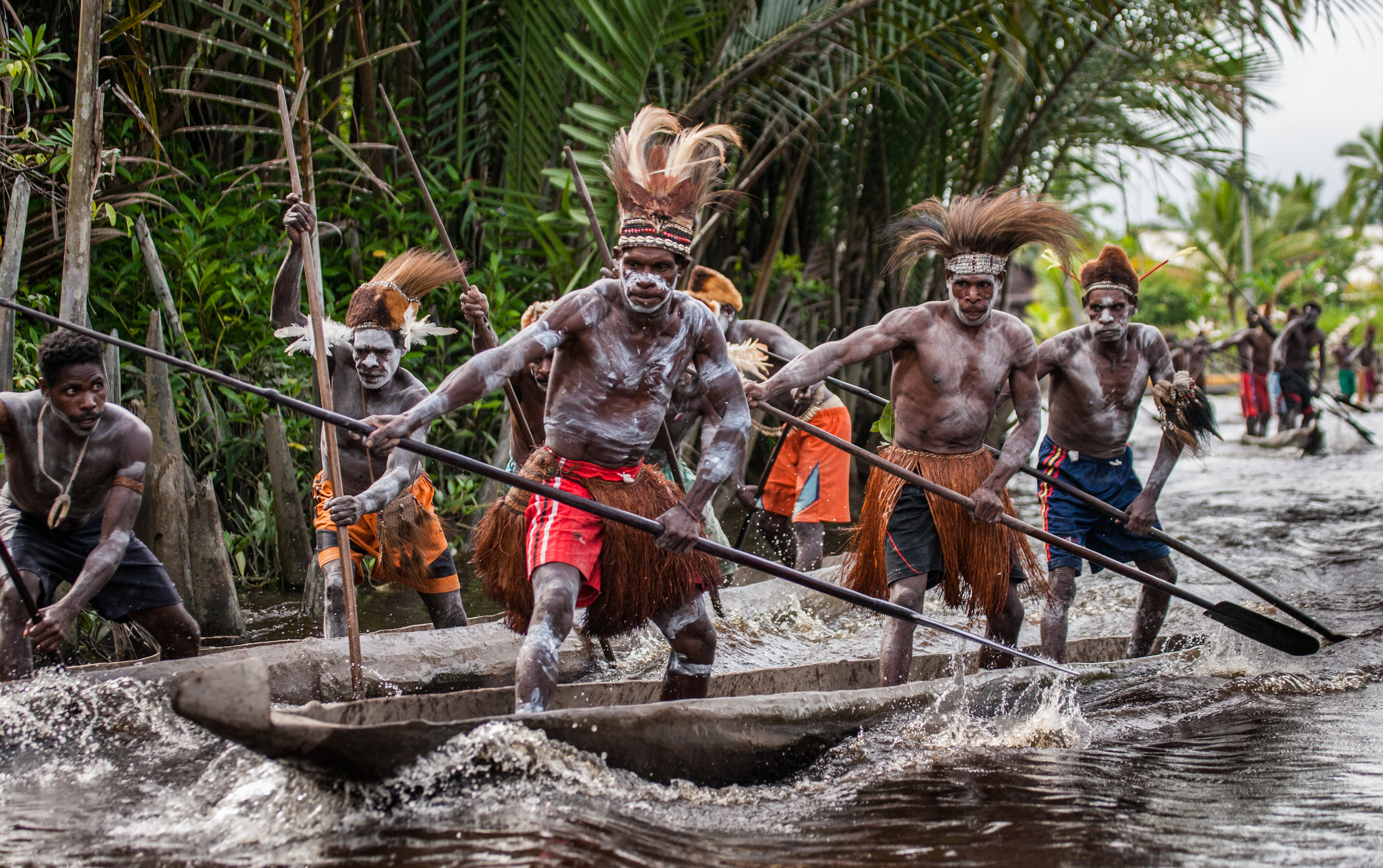 asmat tribe on boats