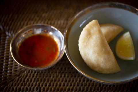 Empanadas and salsa criolla