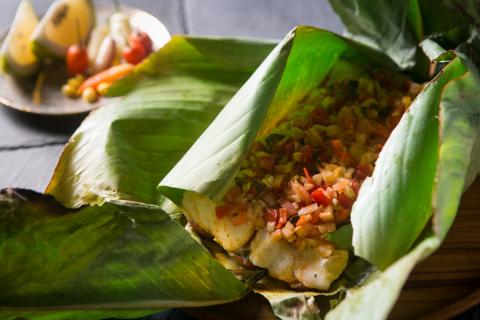 Grilled Tiger Catfish wrapped in Bijao LeafGrilled Tiger Catfish wrapped in Bijao Leaf (Patarashca de Doncella)