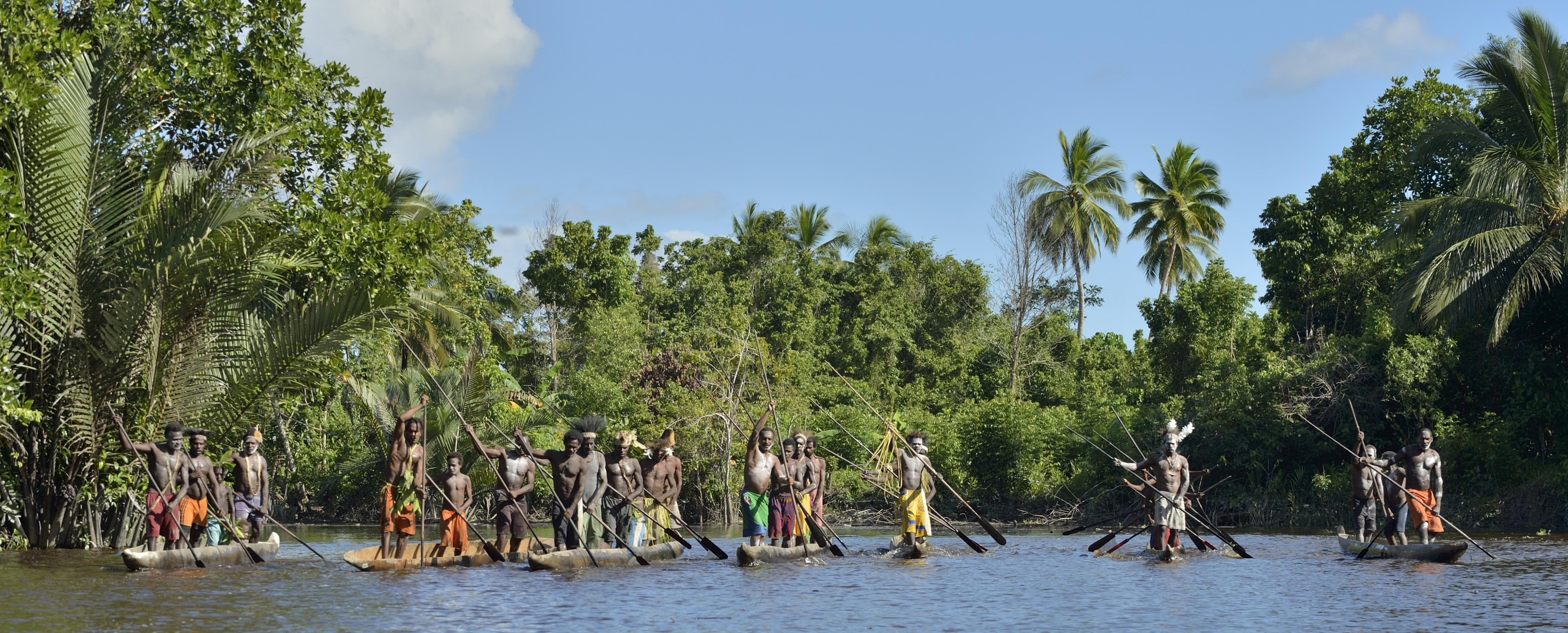 asmat tribe on boats